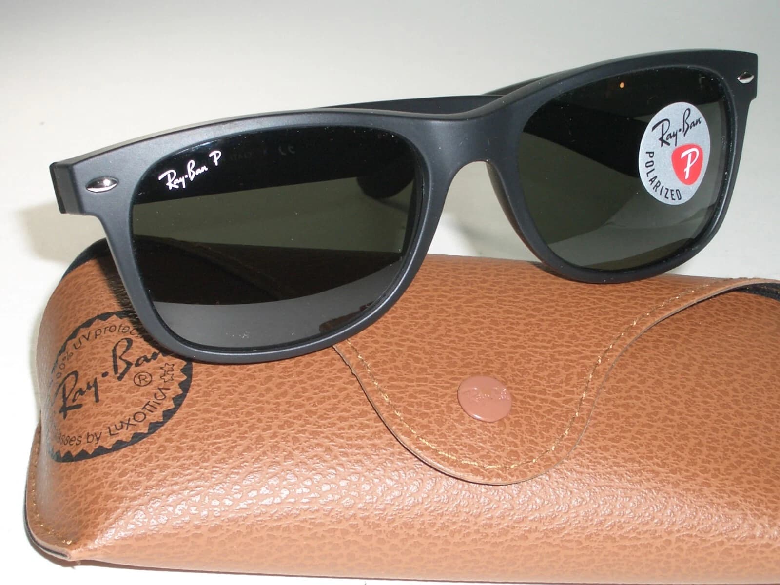 Ray-Ban RB2132 55-18 New Wayfarer – Matte Black Frame, Polarized Crystal Lenses (New) - Image 1